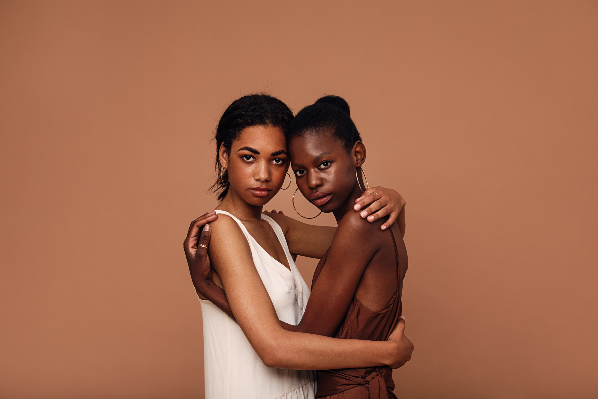 Portrait of Two Females Embracing Each Other